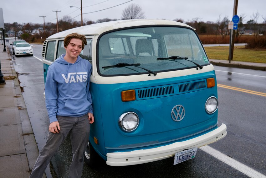 Wyatt Zani, 16, poses next to his 1977 Volkswagen van, which he and his dad transformed into an electric vehicle after many months of work in their home garage. He gets about 120 miles on a full charge. &ldquo;This works for me because I never leave more than 40 miles away from Portsmouth. All I do is cruise around the island and go to beaches,&rdquo; Wyatt said.