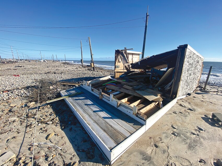 A shack lies in ruins along East Beach Road after the first of three storms to hit Westport since a week before Christmas.