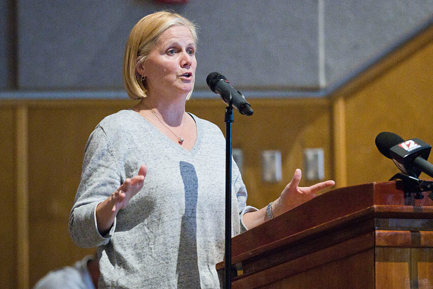 Clements&rsquo; Marketplace owner Tracy Anthony speaks in opposition to a plan to create a roundabout in front of her Portsmouth grocery store during a public forum last month. The ability to speak at public meetings is a New England tradition that goes back centuries.