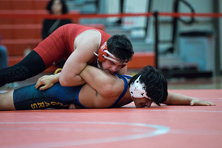 East Providence's Fernat Akdemir controls his opponent from North Providence at 165 pounds en route to a victory for the Townies Thursday night, Jan. 25.