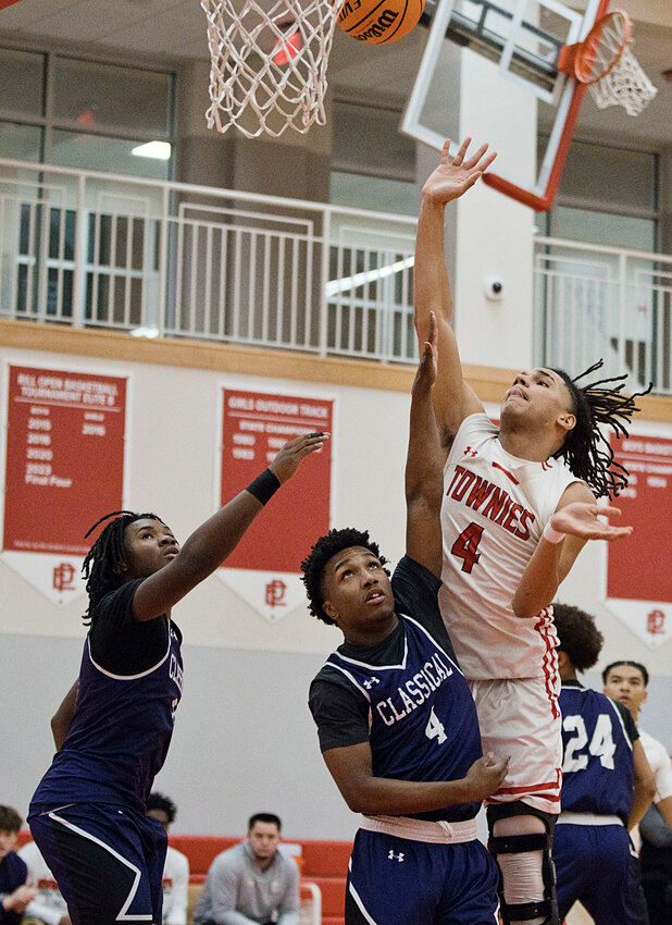 East Providence High School's Levi Jacobs drops in two of his team-best 14 points for the Townies in their Division I boys' basketball loss to visiting and first-place Classical Tuesday night, Jan. 30.