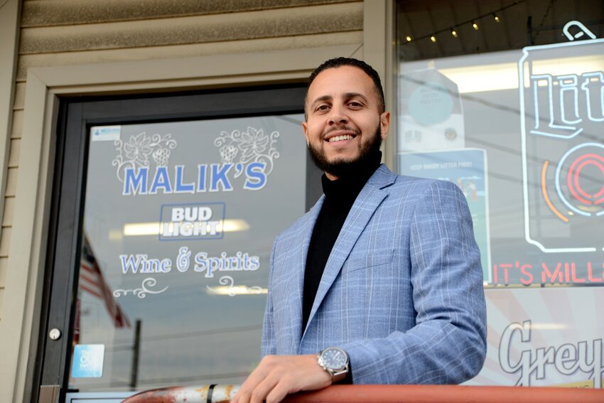 New owner Besho Fareez hopes to continue the successful legacy of Malik's Liquors and Balasco's Pizzeria.