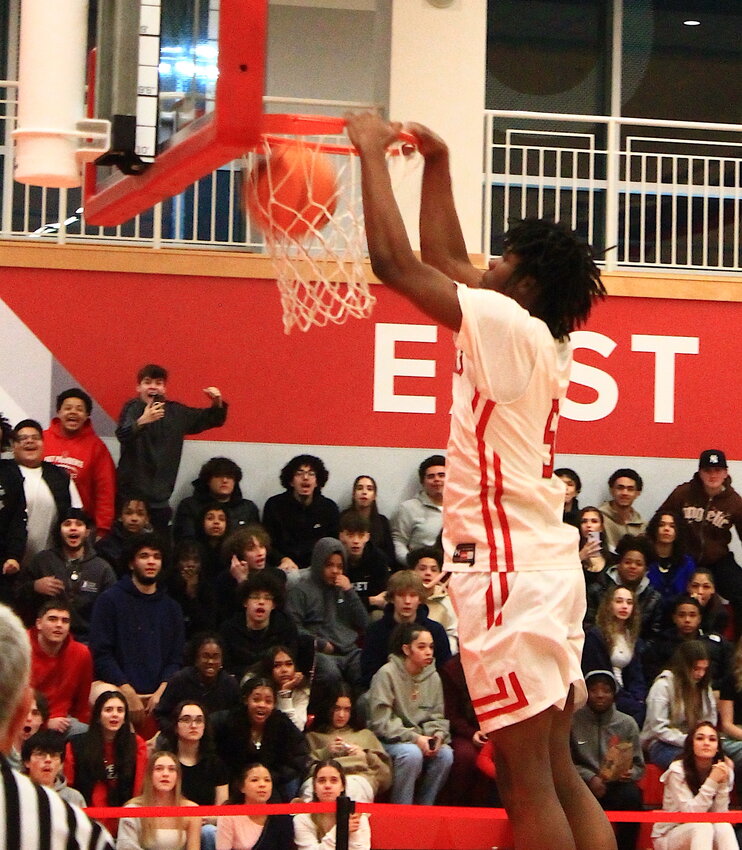 Kenaz Ochgwu slams home one of his four dunks for the EPHS boys' basketball team as the Townies crushed visiting Central Thursday night, Feb. 22, in the preliminary round of the 2024 Division I Championship Tourney.