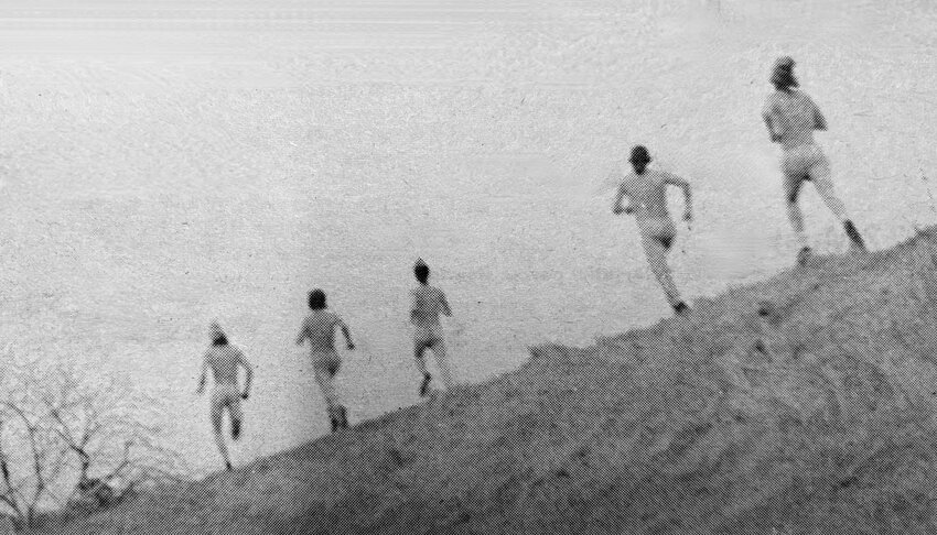 Five young men in the buff dash by the Portsmouth High School tennis courts in March 1974. Students had been tipped off about the incident in advance, with many witnessing the streakers from windows on the west side of the school.