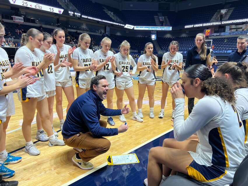 Barrington Coach Stephen Lenz encourages his team during a timeout in the State Semifinals. Barrington led 25-15 and went on to win, 44-29.