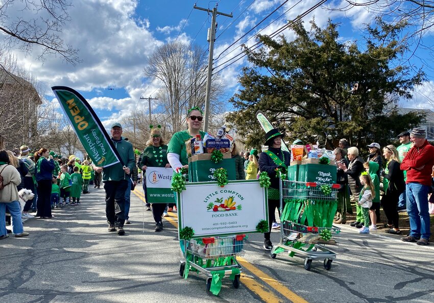 Representatives of the Little Compton Food Bank make their way down the parade route on St. Patrick&rsquo;s Day.