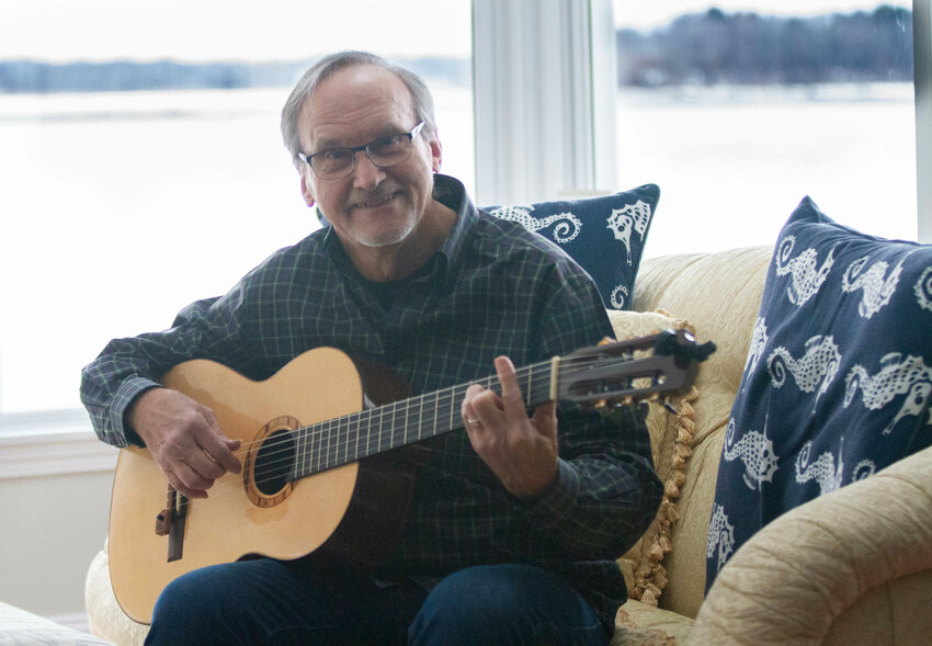 Longtime Barrington resident Ken Totushek plays a song at his home in town. Totushek recently released his ninth album &mdash; this one is titled &ldquo;Island Songs.&rdquo; &ldquo;I love it,&rdquo; Totushek said of the album. &ldquo;I could say they&rsquo;re all my favorites, but they&rsquo;re all different.&rdquo;