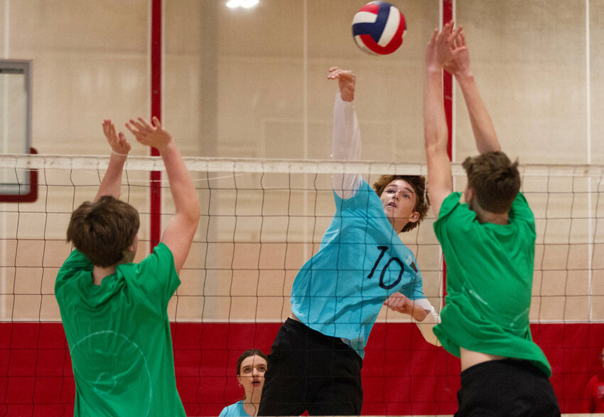 Team Madagascar&rsquo;s Jack Casey slams the ball over the net during Portsmouth High School &rsquo;s 2024 International Volleyball championship match.