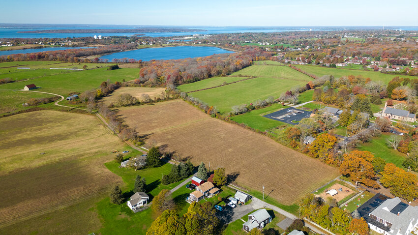 Aerial view shows location of farmland that sold for $3.1 million. St. Mary&rsquo;s Episcopal Church can be seen at right, with St. Mary&rsquo;s Pond in the background.