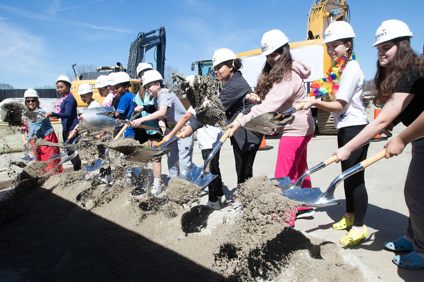 Martin Middle School students participate in the formal groundbreaking ceremony Tuesday, April 9, commemorating the near complete reconstruction of the building.