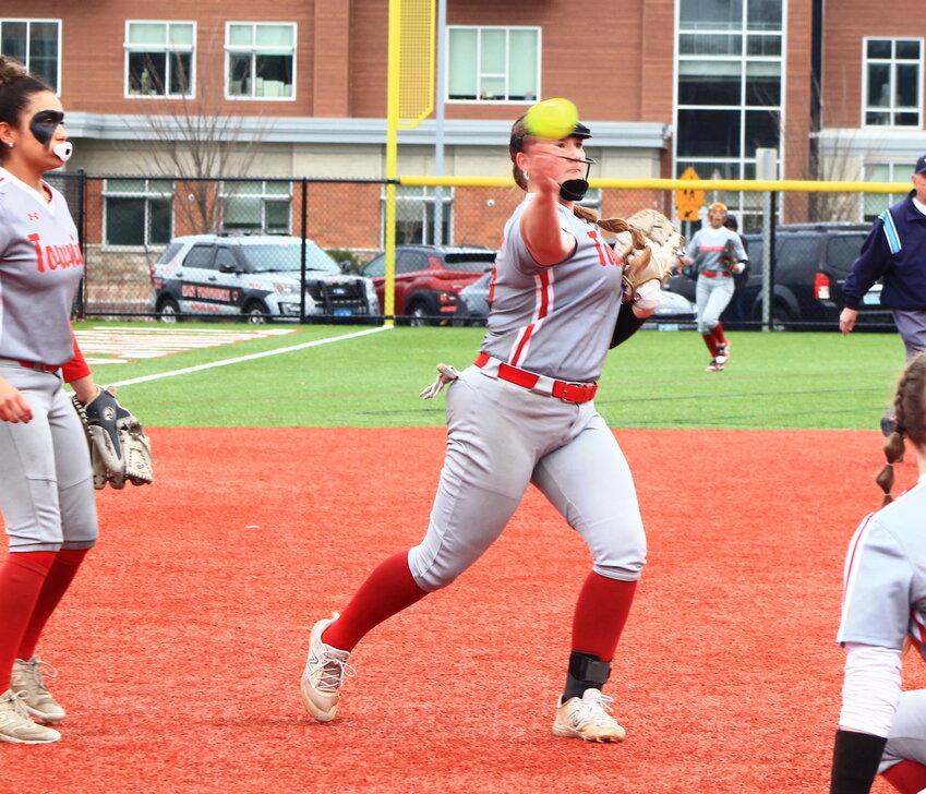 EPHS pitcher Cassie Dulude makes a throw to first base on a LaSalle bunt attempt during the teams' game April 11.