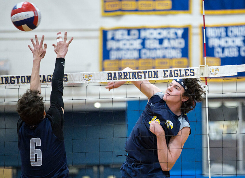 Cam Kelley fires a shot over the net during a match against Westerly, Thursday.
