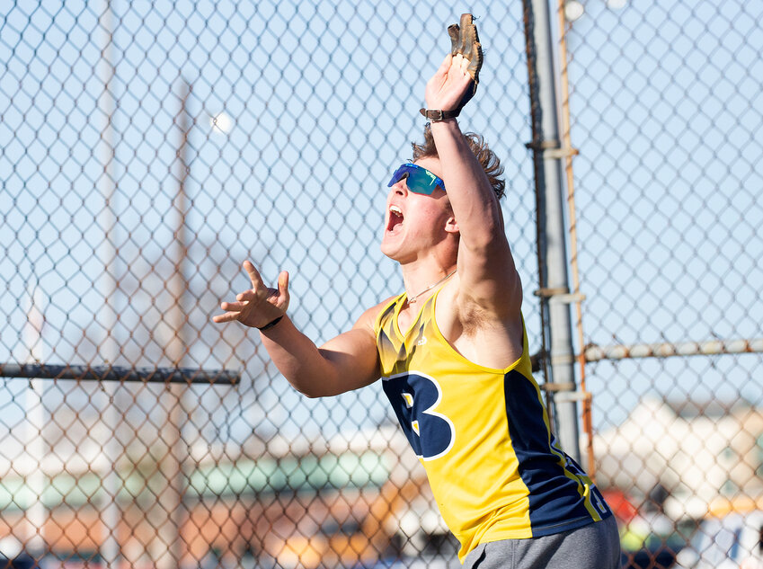 Barrington's Joe Adams throws the hammer during a meet at Portsmouth High School on Tuesday, April 23. Adams won the hammer, shot put and discus.