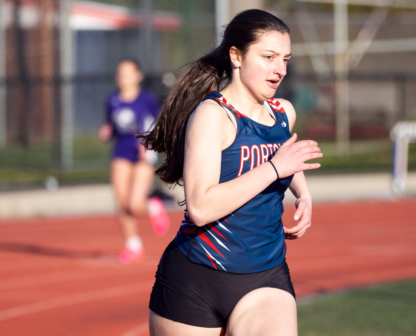 The Patriots&rsquo; Sonia Starschick on her way to winning the 400-meter run in a time of 1:04.8.