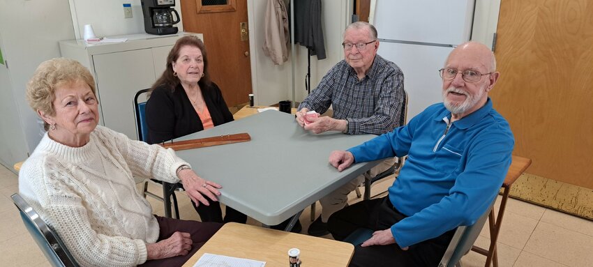 Leading the way for the popular Cribbage activity at the Warren Senior Center are left-right Jeanne Cotta, Rose Cote, Frank Nencka, and Charlie Francis.