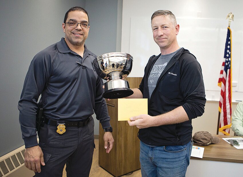 &ldquo;Souper Bowl&rdquo; winner Tony Ward (right) receives his trophy from Westport Police Department Deputy Chief Rob Rebello.