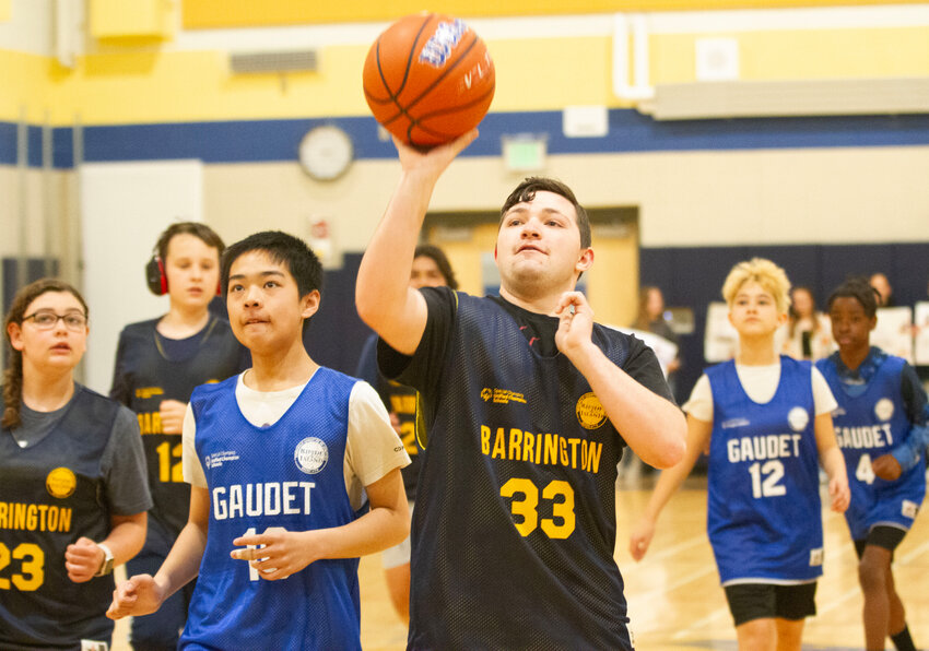 Barrington&rsquo;s Kenny Berg lofts a shot toward the basket during a recent game against Gaudet Middle School.