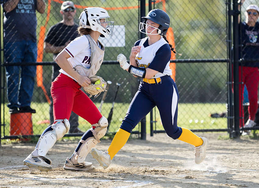 Ariana Renzi is out at the plate during the Eagles' game against Portsmouth on Tuesday.