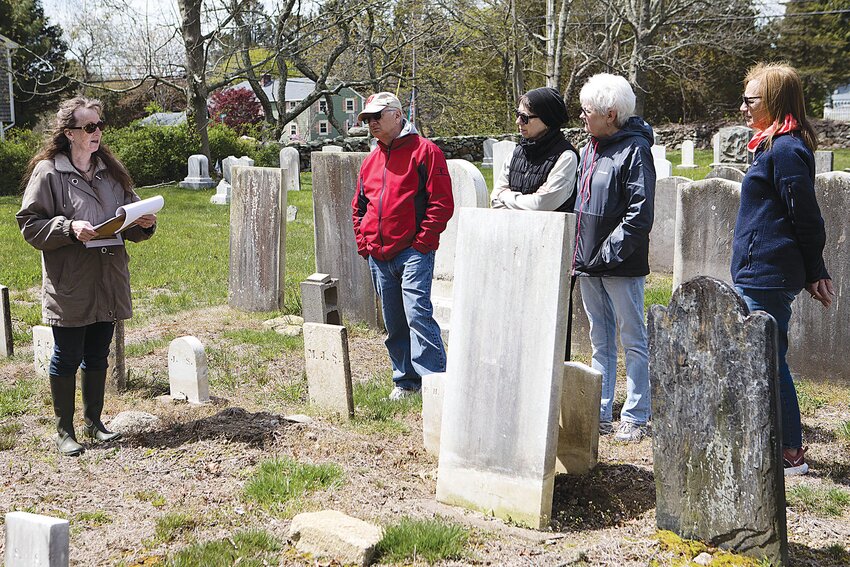 Sue Anderson tells stories of those interred at one of the town&rsquo;s 90 historic cemeteries during a tour last Saturday.