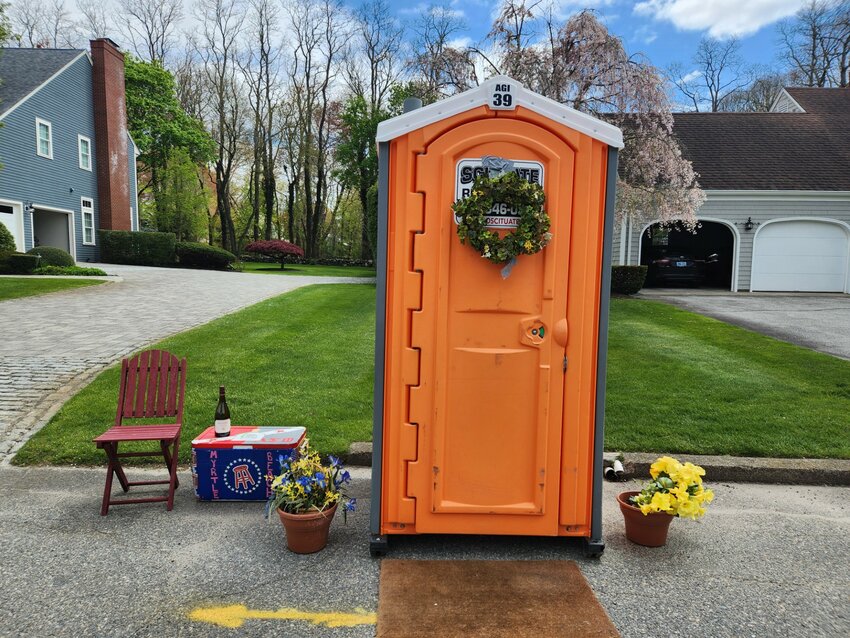 Rhode Island Energy left a porta potty on Aaron Avenue while continuing ongoing work in the area. Local residents took the opportunity to have some fun.