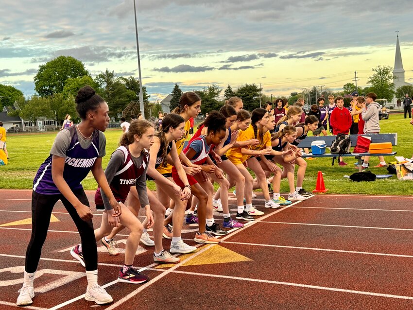 Runners get ready for the start of an event during the Middle School Eastern Division Track Championship last week.