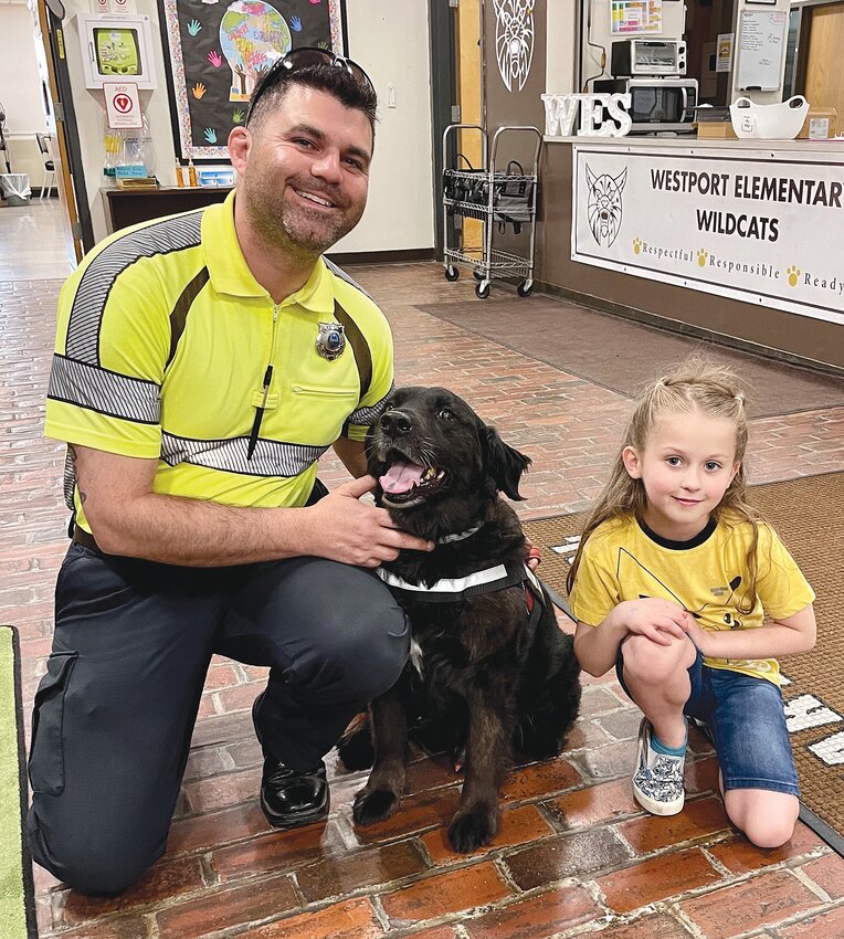Barry and handler Kyle Fernandes recently brought smiles to the Westport Elementary School.