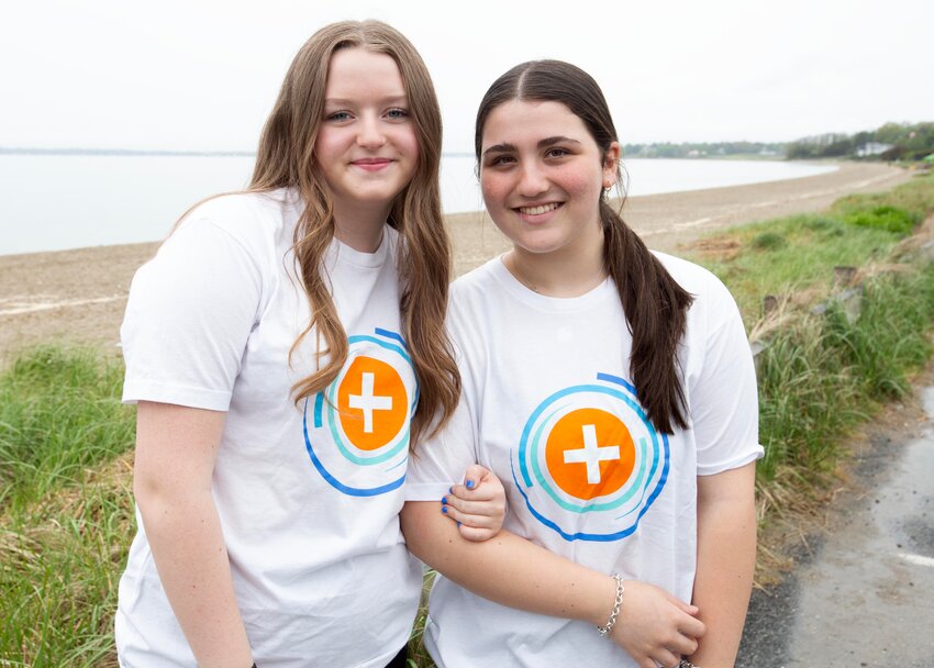 Barrington Middle School eighth-graders Maggie Searles (left) and Georgia Gorfinkle will hold a fund-raiser at Barrington Beach on Saturday, May 18 to support children who have lost a parent. The money raised will go to Fleur de Lis camp, which offers a free week of camp to girls who have lost a parent.