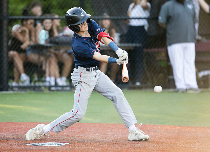 Portsmouth High&rsquo;s Charlie Cord connects with a pitch while battling La Salle Academy in the Division I playoffs on Wednesday. The Patriots were eliminated by a score of 4-1.