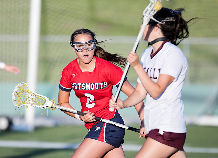 Portsmouth High&rsquo;s Gyselle Mairs contains a La Salle opponent along the sideline during last week&rsquo;s semifinal Division I lacrosse matchup.