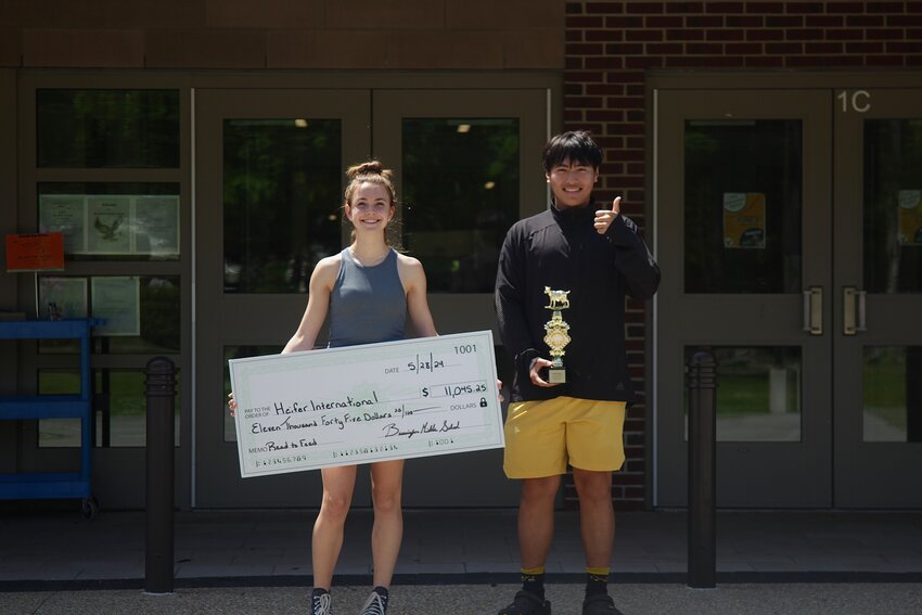 Barrington Middle School students Gracie Gaines (left) and Eddie Wang raised the most money in the recent &ldquo;Read to Feed&rdquo; fund-raiser.