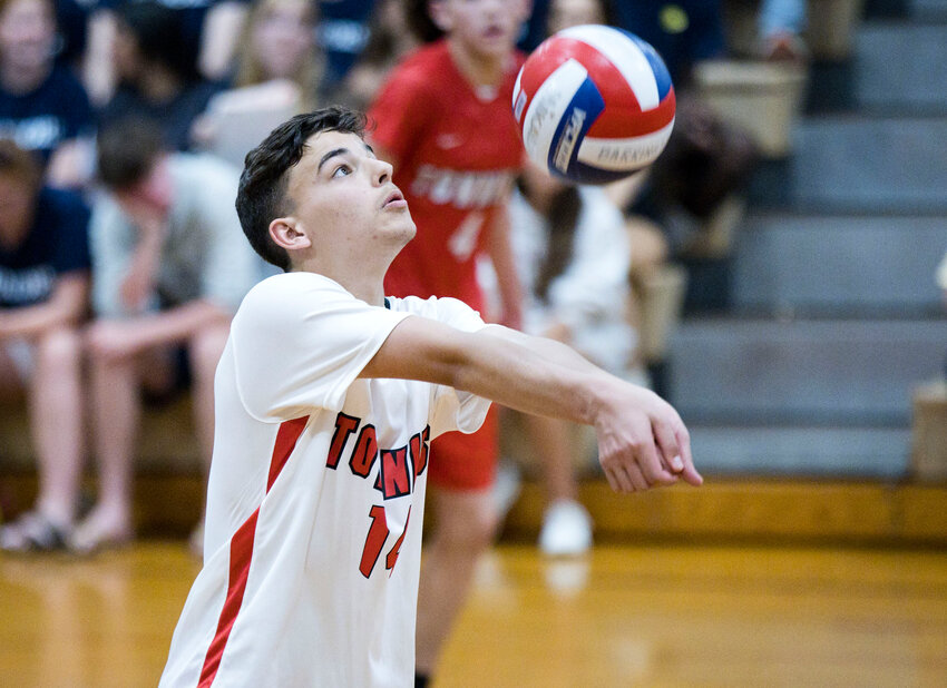 Logan Calouro bumps a pass for the EPHS boys' volleyball team in the Townies' Division II boys' semifinal playoff match Wednesday night, June 5.