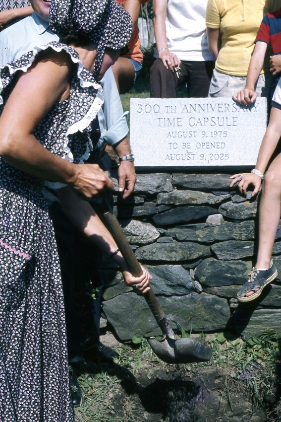 Carolyn Montgomery helps dig a hole for the time capsule placed at Pike&rsquo;s Peak in 1975. The capsule will be opened in August 2025.