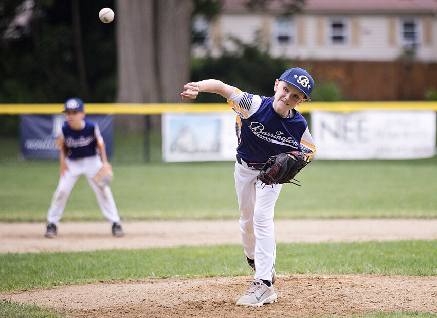 Barrington&rsquo;s Andrew Knychalski delivers a pitch to a Portsmouth batter.