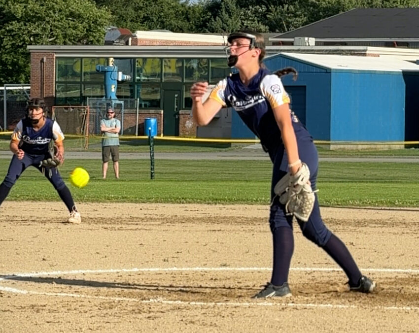 Audrey Paxton fires a strike toward the plate during Barrington's 11-3 win over Portsmouth in the first game of the District 2 finals.