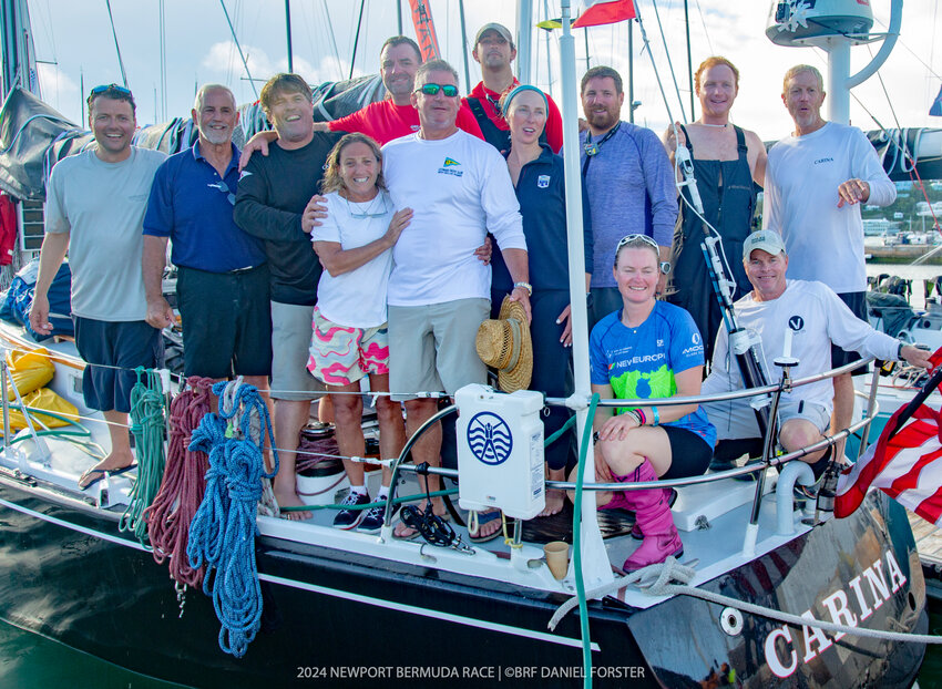 The &ldquo;Carina&rdquo; crew poses for a photo after the race.