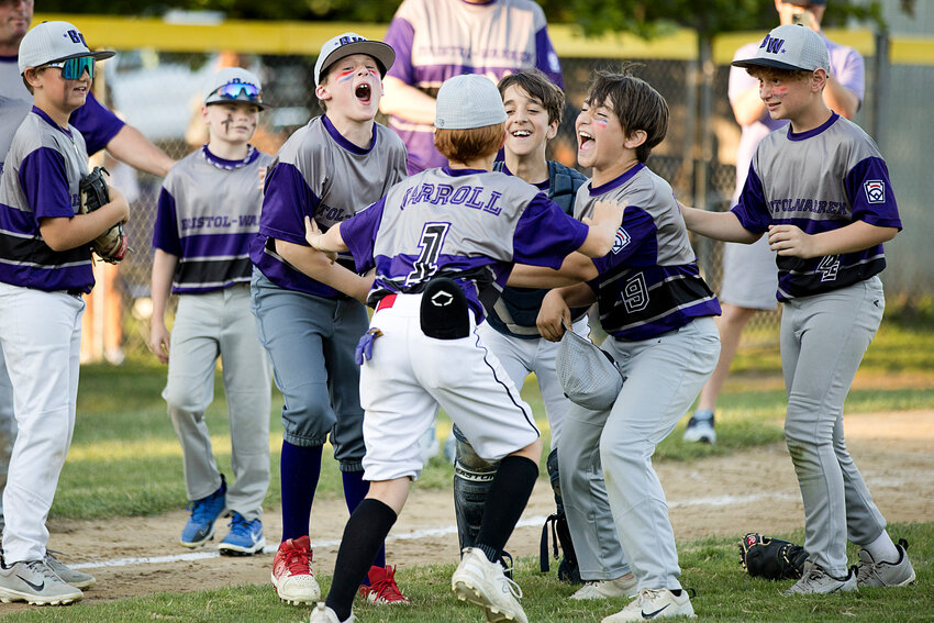 The Bristol/Warren 11U All Star team celebrates after shutting Barrington out in the District 2 finals, Tuesday.