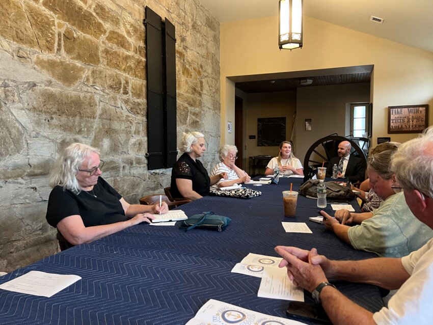 Members of the Warren Fourth of July 250 Commission meet with Lauren Fogarty, Program Coordinator for the Rhode Island Semiquincentennial (250th) Commission, and Rob Rock, Deputy Secretary of State of Rhode Island during a meeting at the Historic Warren armory on Monday night.