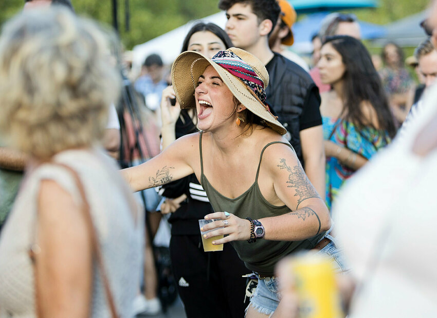 Julia Tomilson dances to music by Joe Bruce and friends during the 6th annual Warren Folks Fest in 2022.