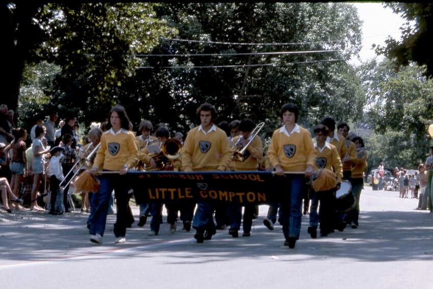 Wilbur School students carry the banner and play for the crowd during the town&rsquo;s 300th anniversary celebration in 1975.