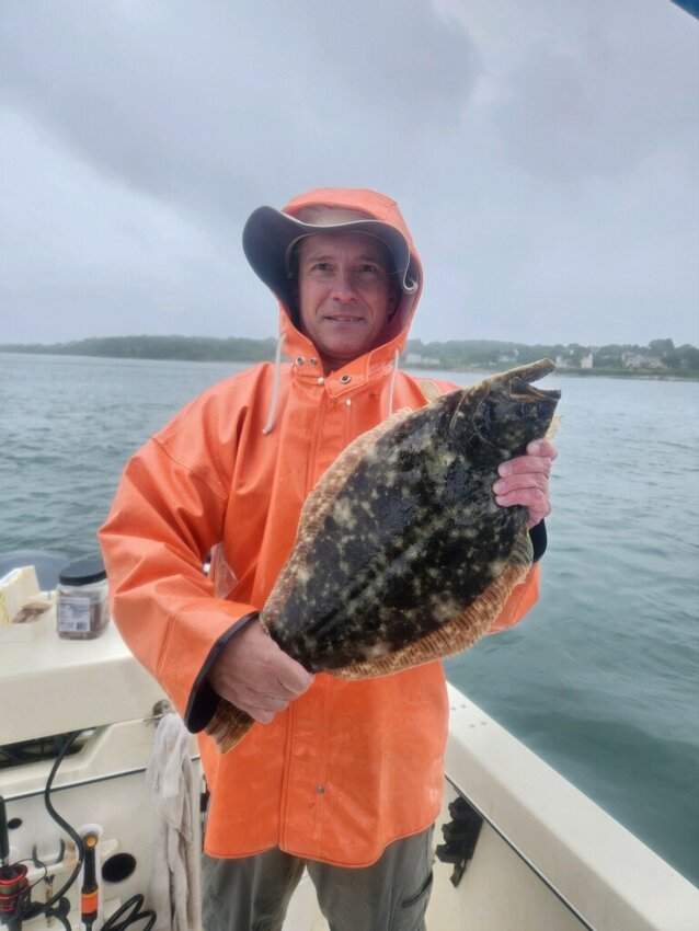 Joe Klinger of South Kingstown with a 22&rdquo; summer flounder (fluke) he caught off Jamestown in the West Passage this weekend.