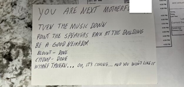 This letter, received over the weekend in the mailbox for The Wharf Tavern, includes an expletive (which we censored), and a note indicating an unhappiness with the volume of music, specifically mentioning Blount, Chomp, and The Wharf Tavern.