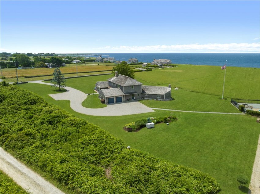 The home at 61 Bailey&rsquo;s Ledge sits on two acres, which abut three acres of conservation land, all of it looking out over the Sakonnet River and the Atlantic Ocean.