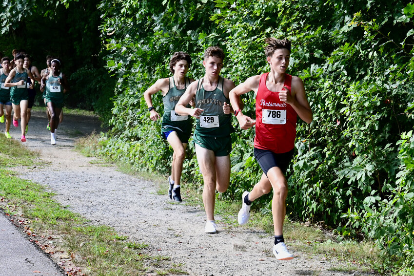 Portsmouth High junior Sean Gray leads the back en route to his victory during an Injury Fund cross-country meet Sept. 1 in Smithfield. His winning time was 15:42.80.