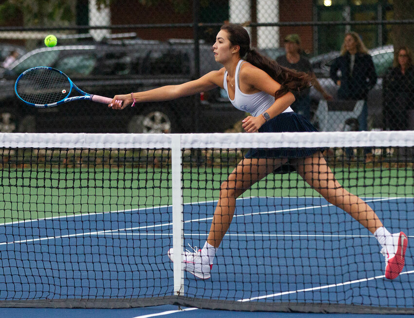 Barrington High School&rsquo;s Jasmine Malik reaches for a shot during the number one doubles match on Wednesday.