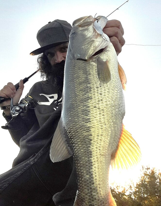 Angler Jeff Sullivan of Lucky Bait &amp; Tackle, Warren with a six pound largemouth bass caught early Monday morning.