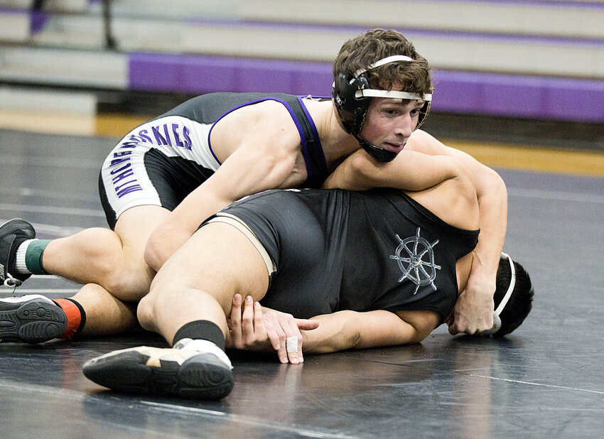 Ethan Martel controls his North Kingstown opponent at 138 pounds during Mt. Hope's recent RIIL Division I match at home January 2. The weekend prior at a tournament in Marshfield, Mass., Martel, a senior, earned the 100th victory of his career at Mt. Hope.