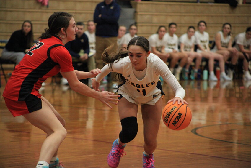 Olivia Morrissette drives to the basket during the Eagles&rsquo; game against Cranston West.