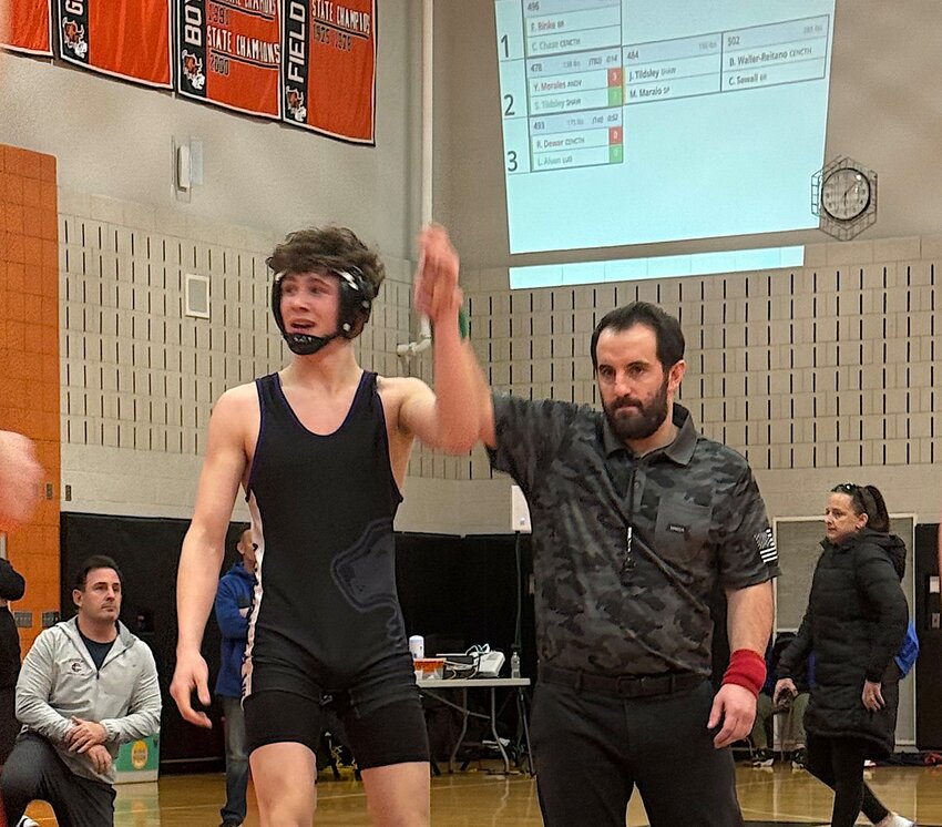 Mt. Hope High School freshman Kyle McCarthy has his hand raised following his victory in the 144-pound weight class championship match at the Woburn (Mass.) Invitational tournament held Saturday, Jan. 18.