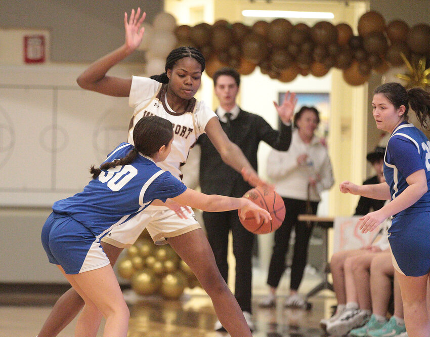 Jenna Egbe stops a Blue Devils offensive attack during the Wildcats 37-30 win over Fairhaven on Tuesday night.