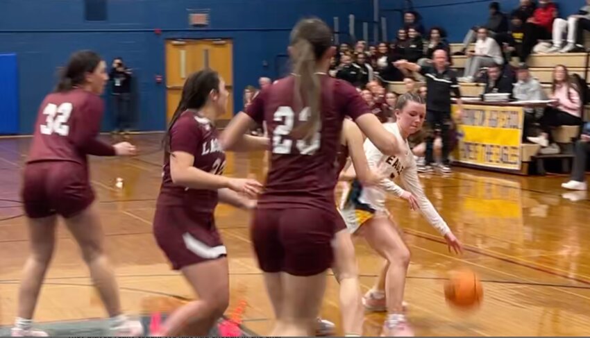 Barrington's Riley Graveline drives to the basket with time running down in the fourth period.